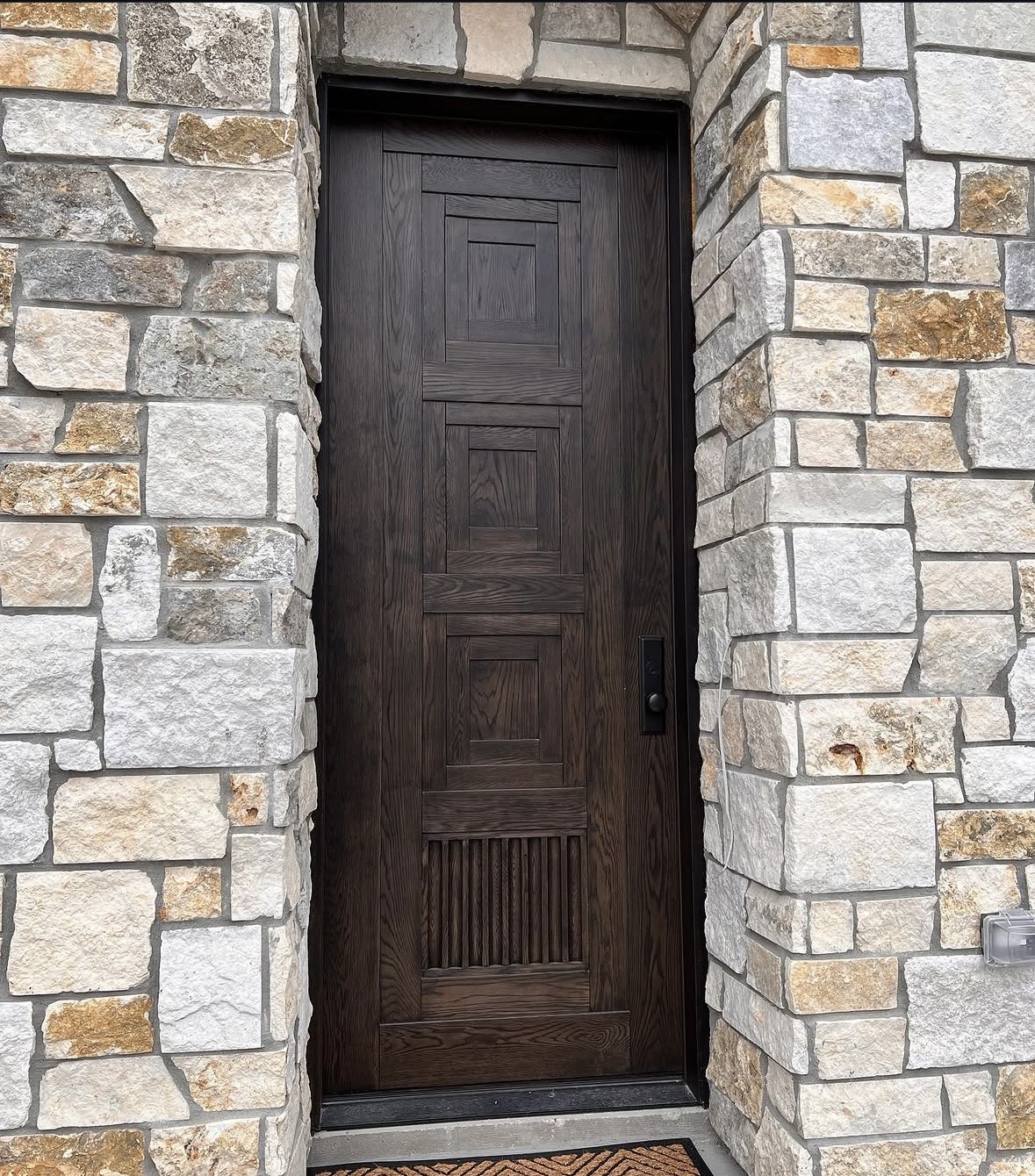 Oak front door with geometric panels