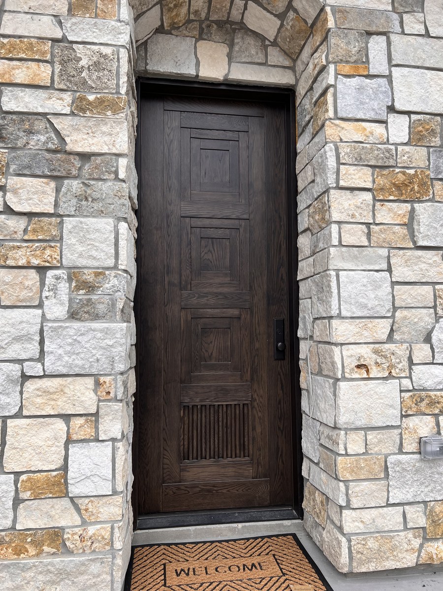 Oak front door with geometric panels